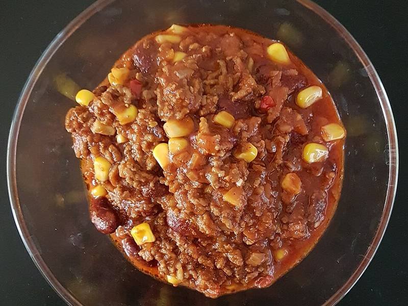Chili con Carne — mexican dinner recipe, served and ready to eat