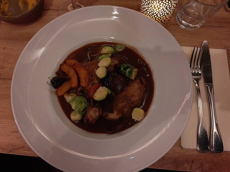 Coq au Vin — french dinner recipe, served and ready to eat