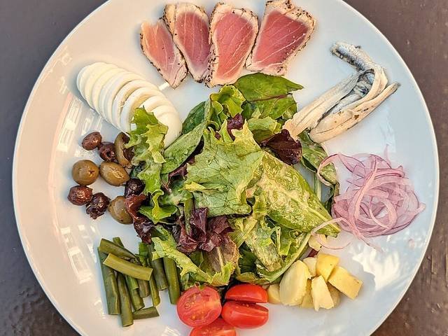 Ingredients and preparation for salade niçoise